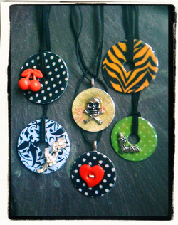 Altered steel washer pendants polka dots, tiger print, cherries, heart button, bat.