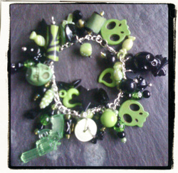 Loaded lime and black charm bracelet with gumball charms.